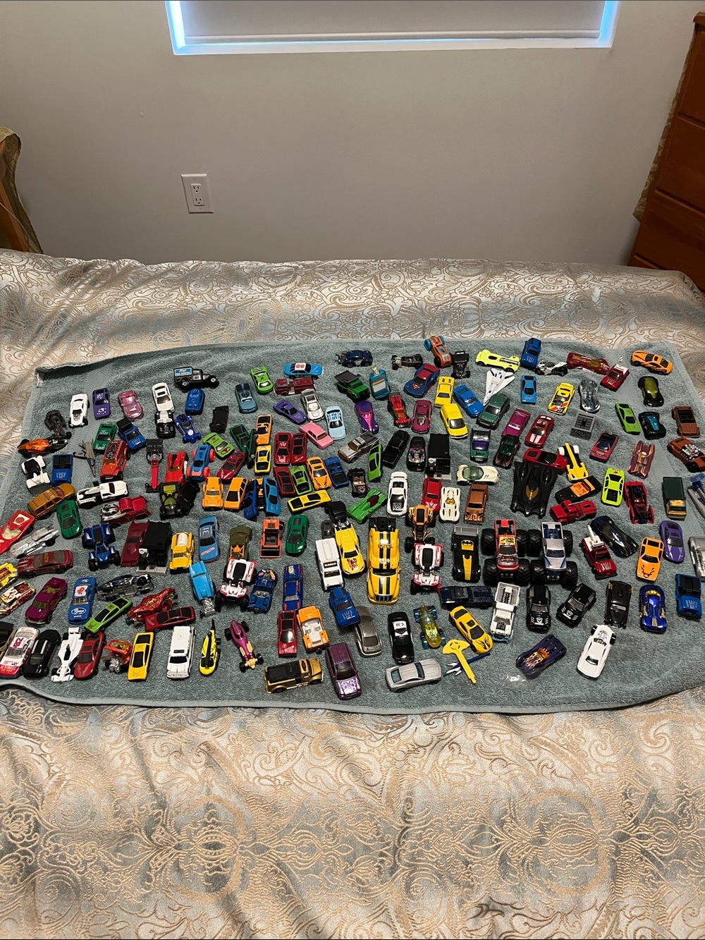 Large lot of Hotwheels, Corgi and Matchbox and other brand cars As is